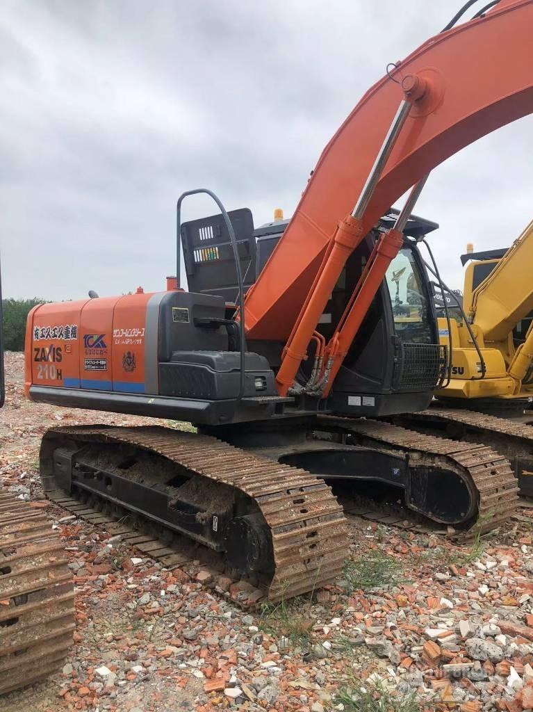 Hitachi ZX 210 Bandgrävare