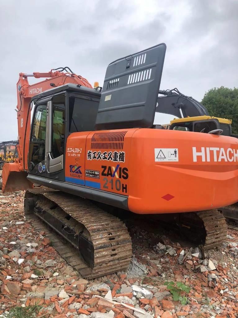 Hitachi ZX 210 Bandgrävare