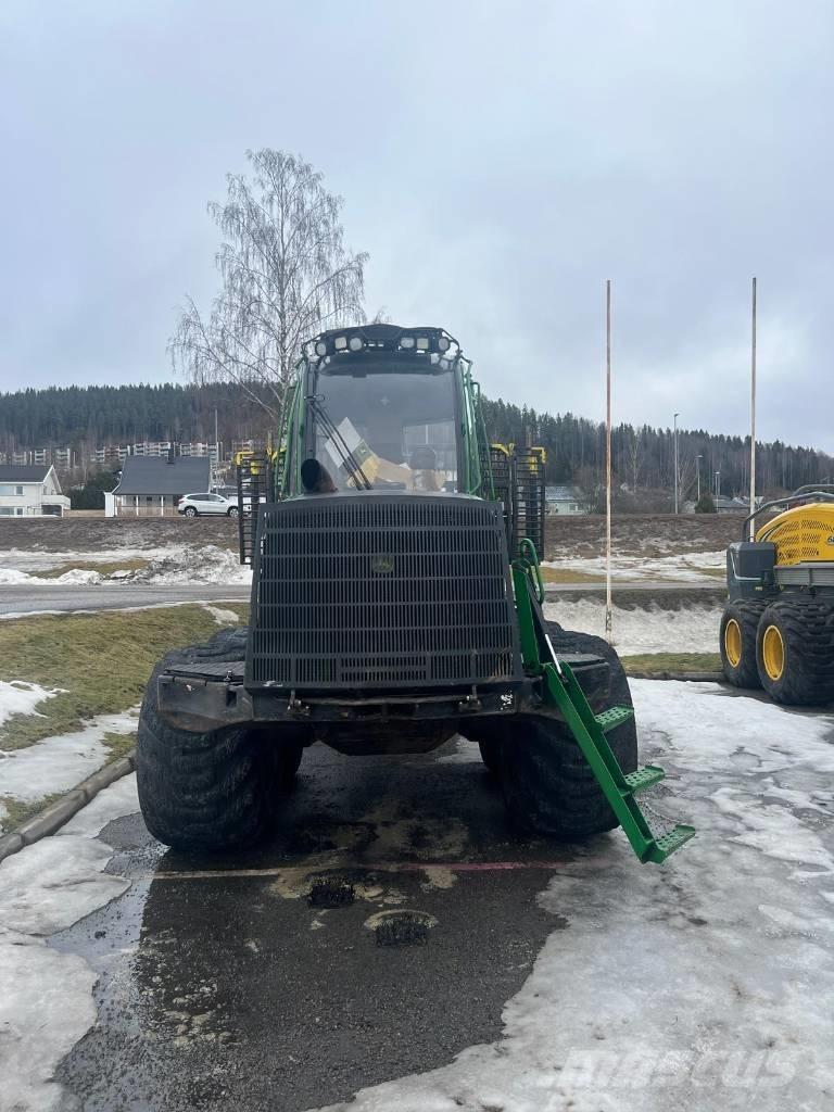 John Deere 1210 E Skotare