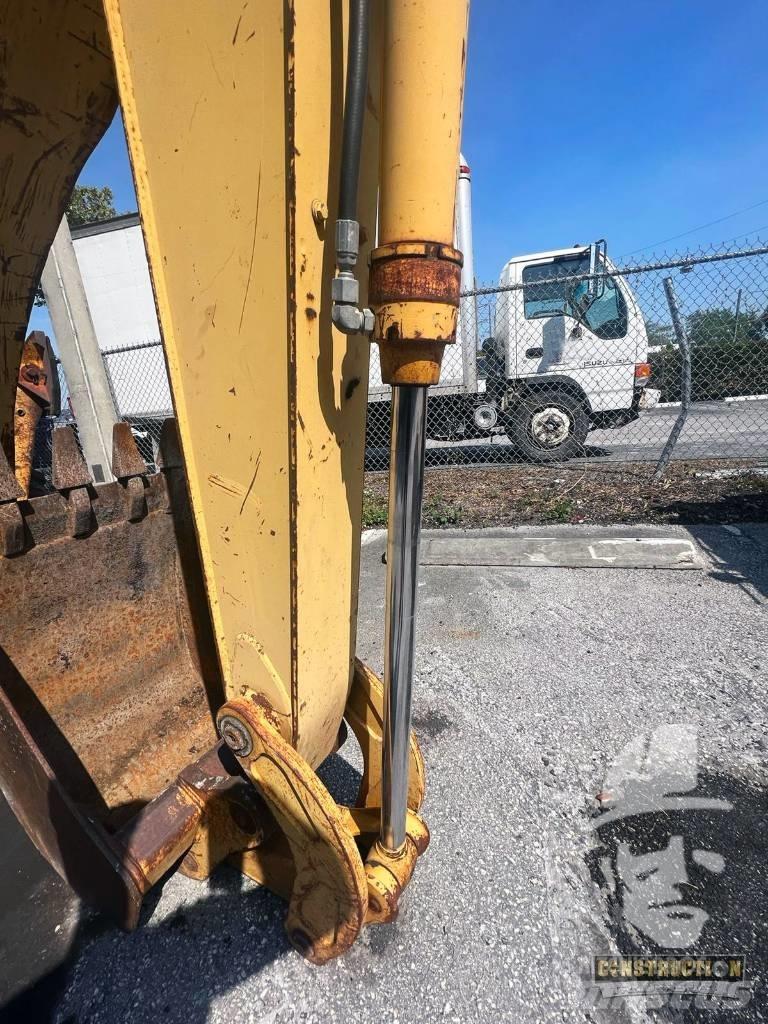 DEERE 310G Grävlastare