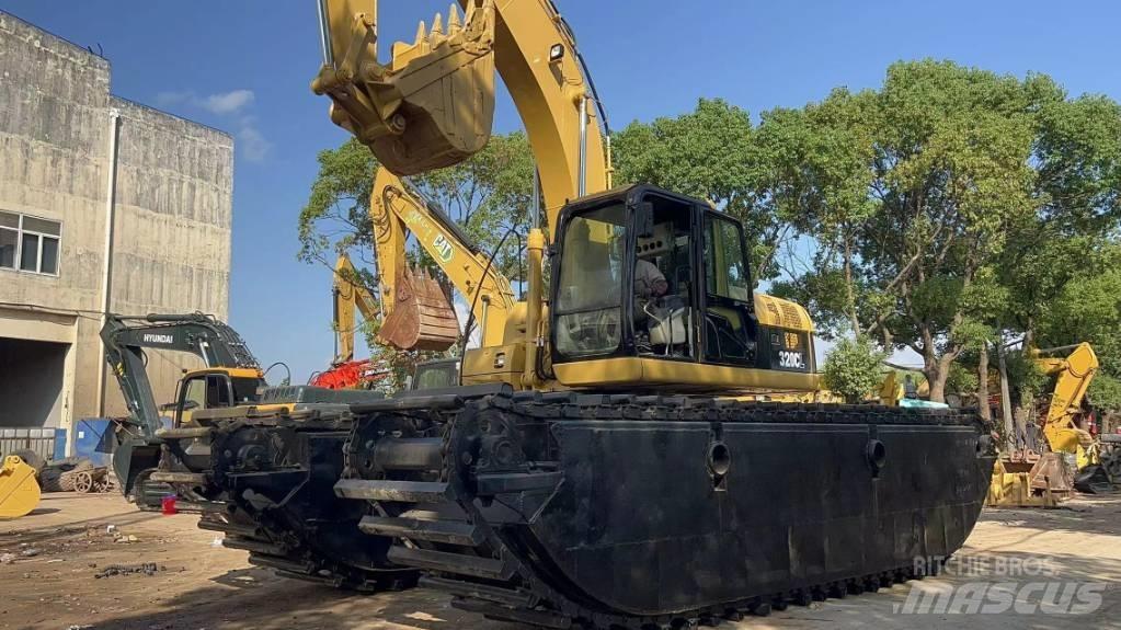 CAT 320 C Amfibiska grävmaskiner