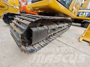 CAT 323 Bandgrävare