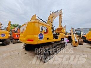 CAT 323 Bandgrävare