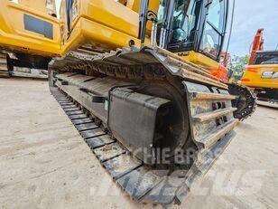 CAT 323 Bandgrävare