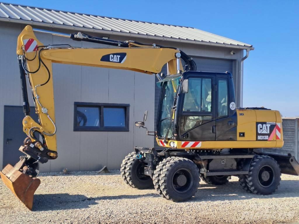 CAT M 313D Hjulgrävare