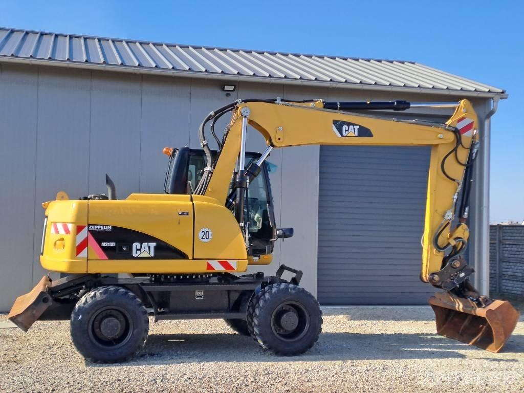 CAT M 313D Hjulgrävare