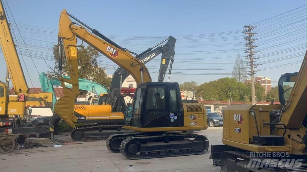 CAT 313 D Bandgrävare