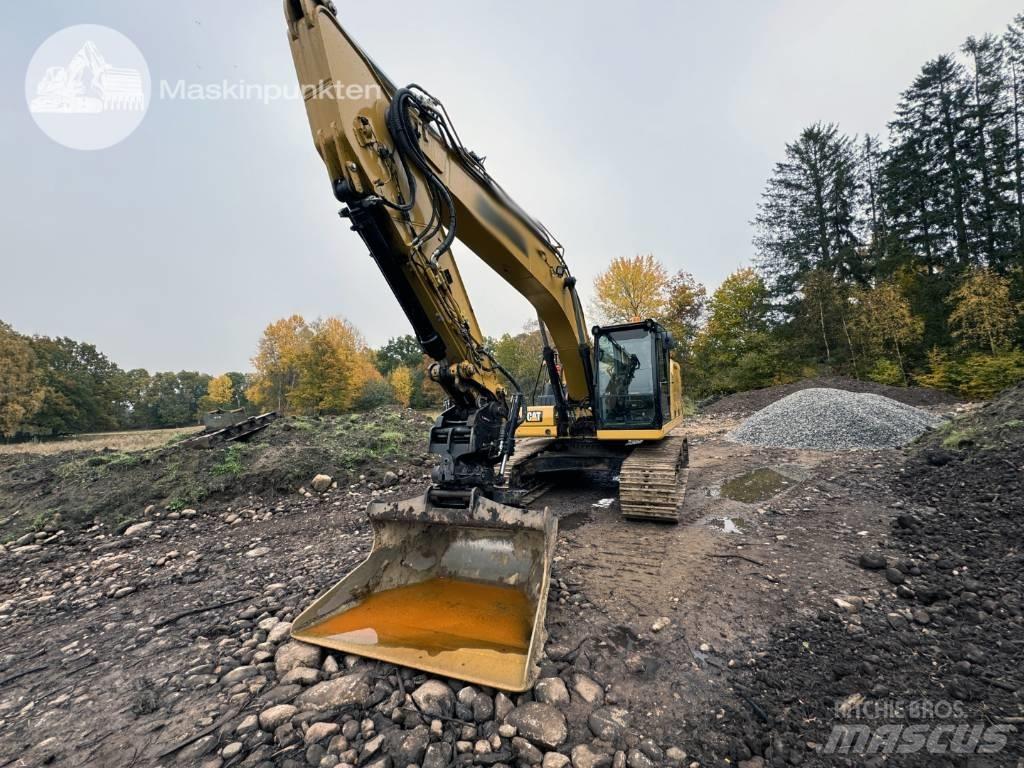 CAT 323 Bandgrävare