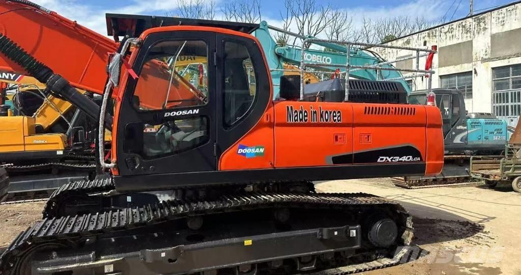 Doosan DX340 Bandgrävare