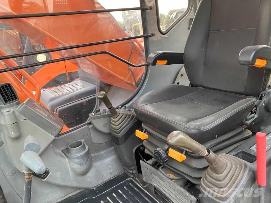 Hitachi ZX 210 Bandgrävare