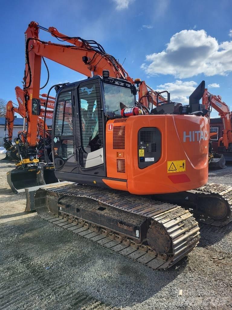 Hitachi ZX 135 US-6 Bandgrävare