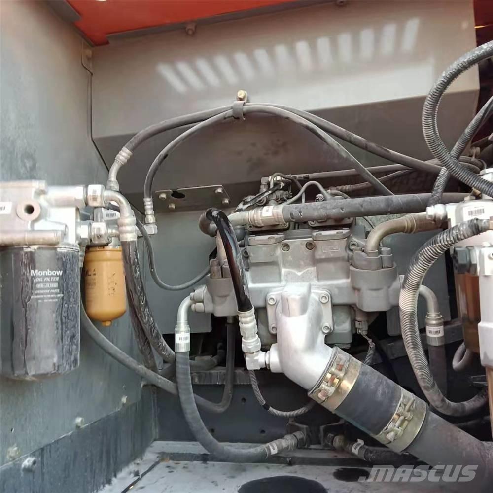 Hitachi ZX210 Bandgrävare