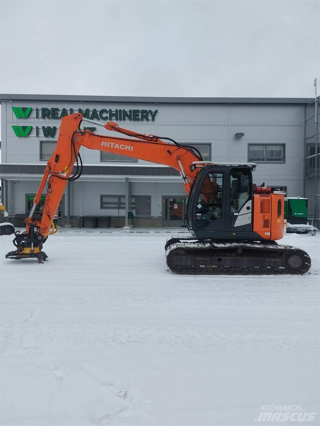 Hitachi ZX135US-5B Bandgrävare