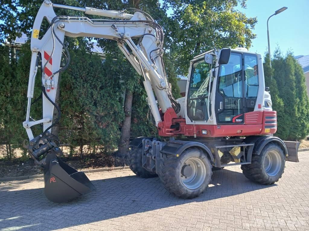 Takeuchi TB 295 W Hjulgrävare