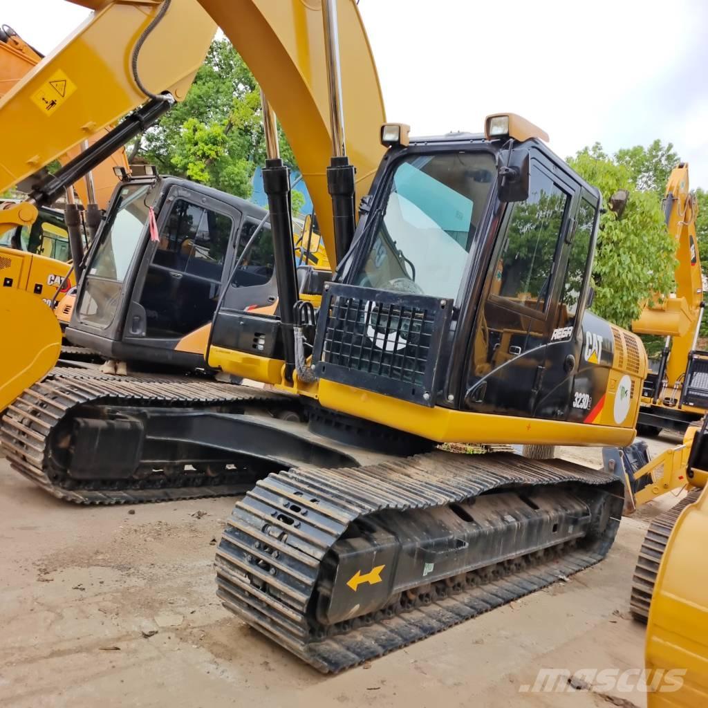 CAT 323 D Bandgrävare