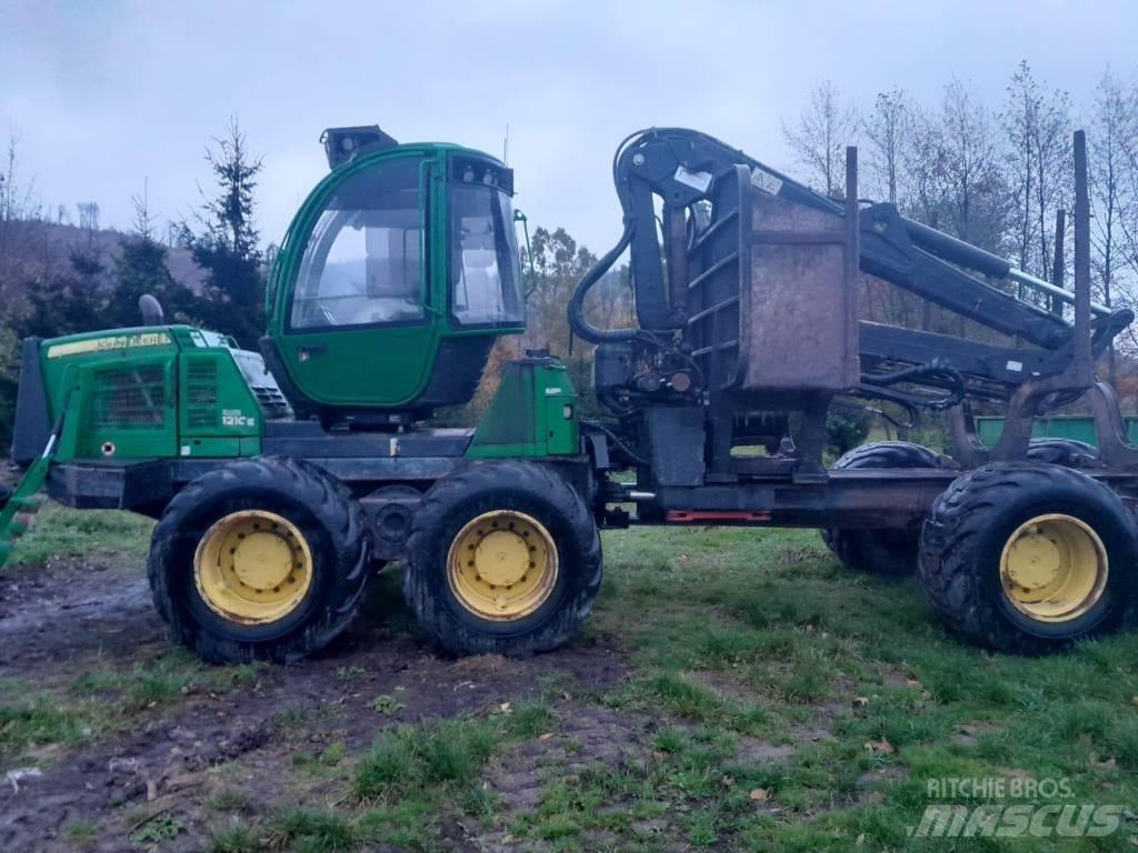 John Deere 1210 E Skotare