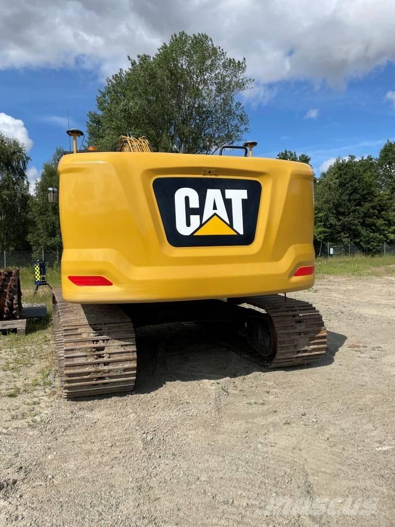 CAT 323 Bandgrävare