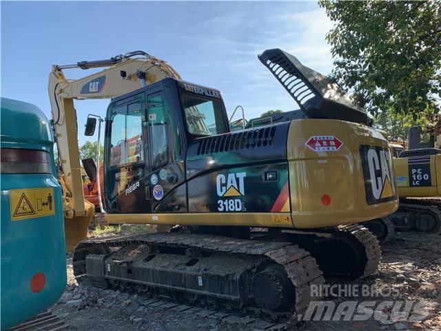 CAT 318DL Bandgrävare
