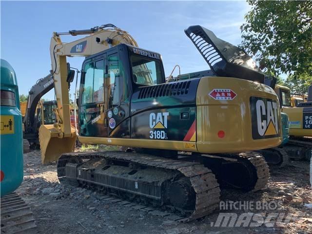 CAT 318DL Bandgrävare