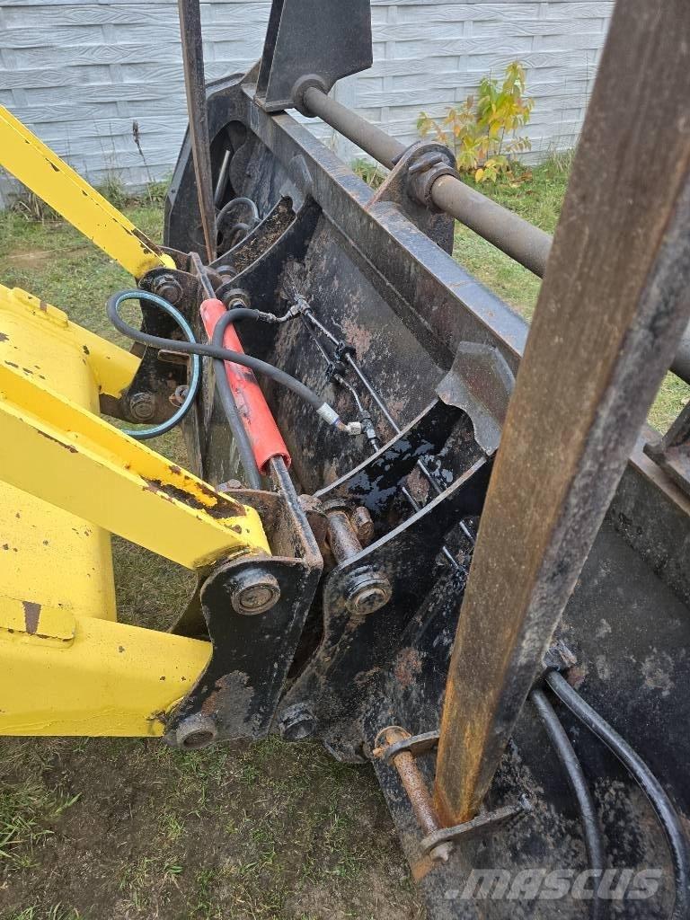 New Holland 115 Grävlastare