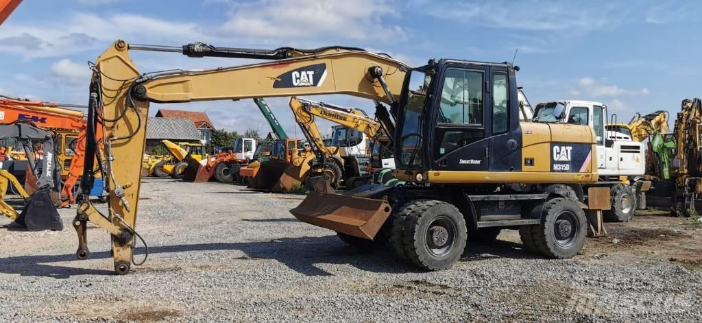 CAT M 315 D Hjulgrävare