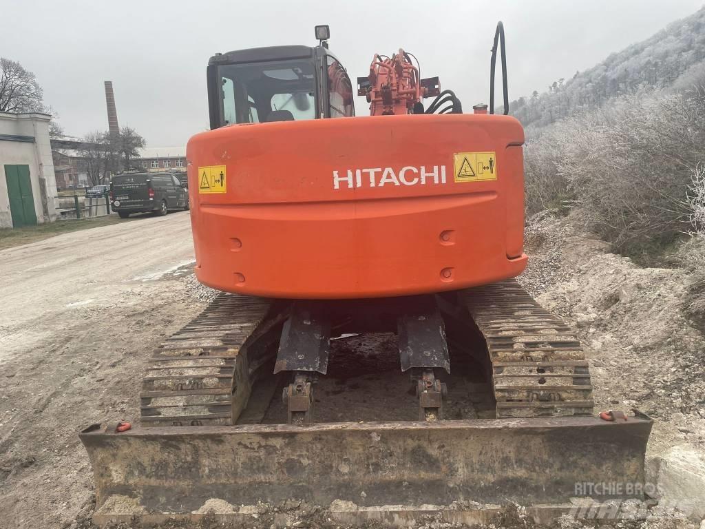 Hitachi ZX 135 US Bandgrävare