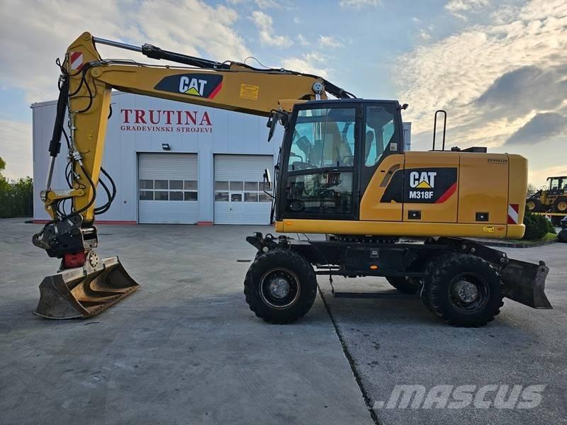 CAT M 318 F Hjulgrävare