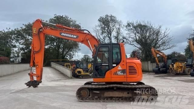 Doosan DX 140 Bandgrävare