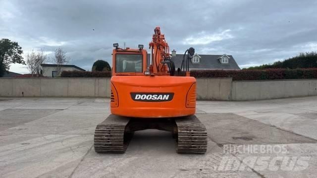 Doosan DX 140 Bandgrävare