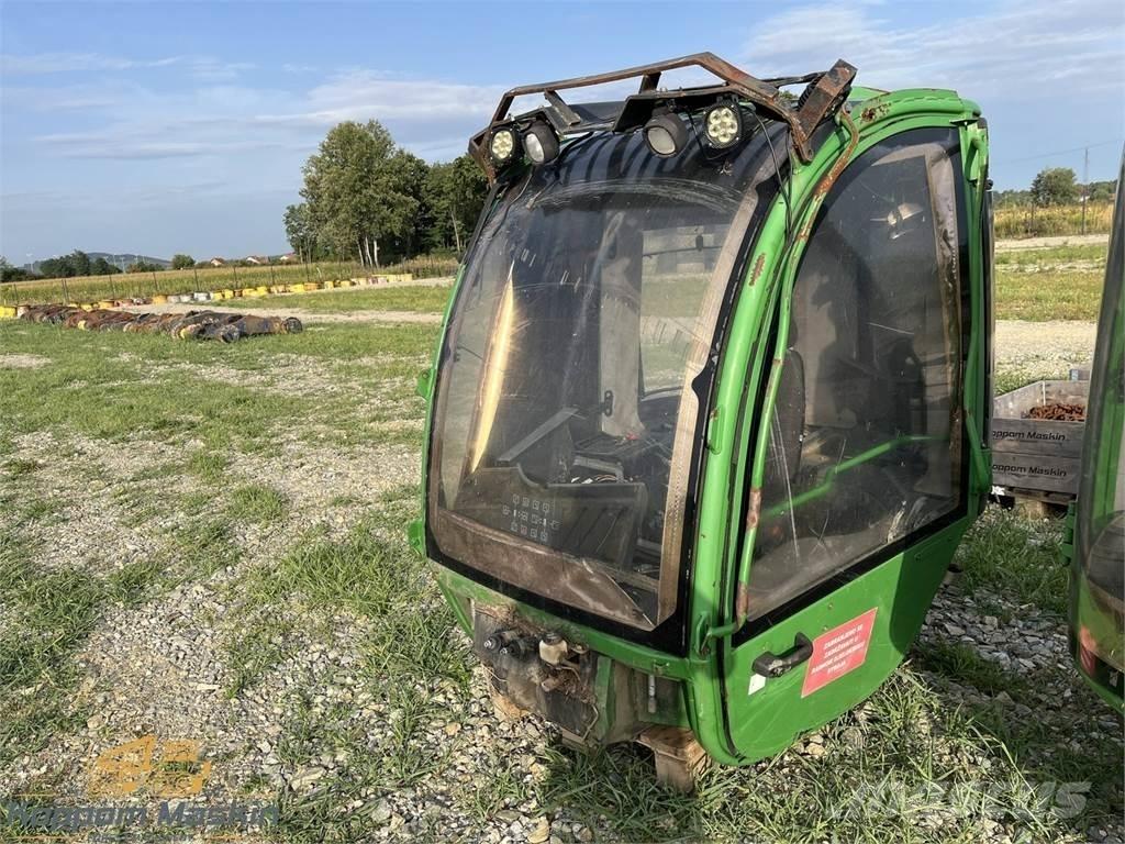 John Deere 1010E Hytter och interiör