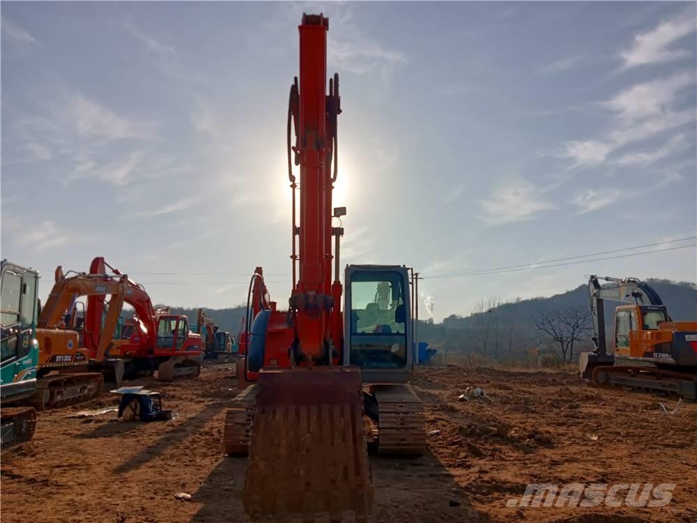 Hitachi ZX135US Bandgrävare