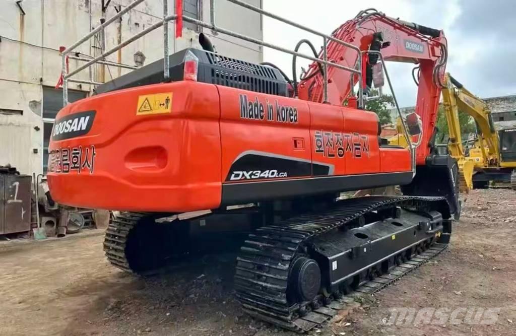 Doosan DX 340 Bandgrävare