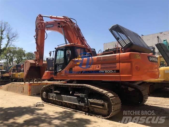 Doosan DX 500LC Bandgrävare