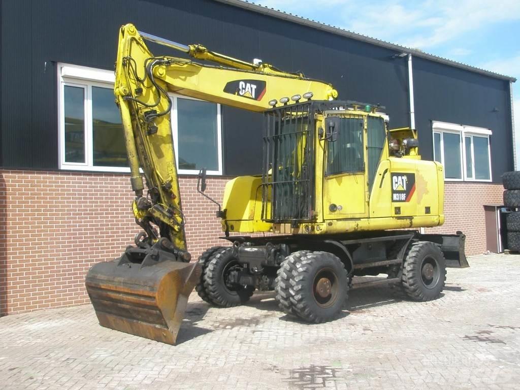 CAT M318F Hjulgrävare