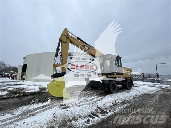 CAT M318D Hjulgrävare