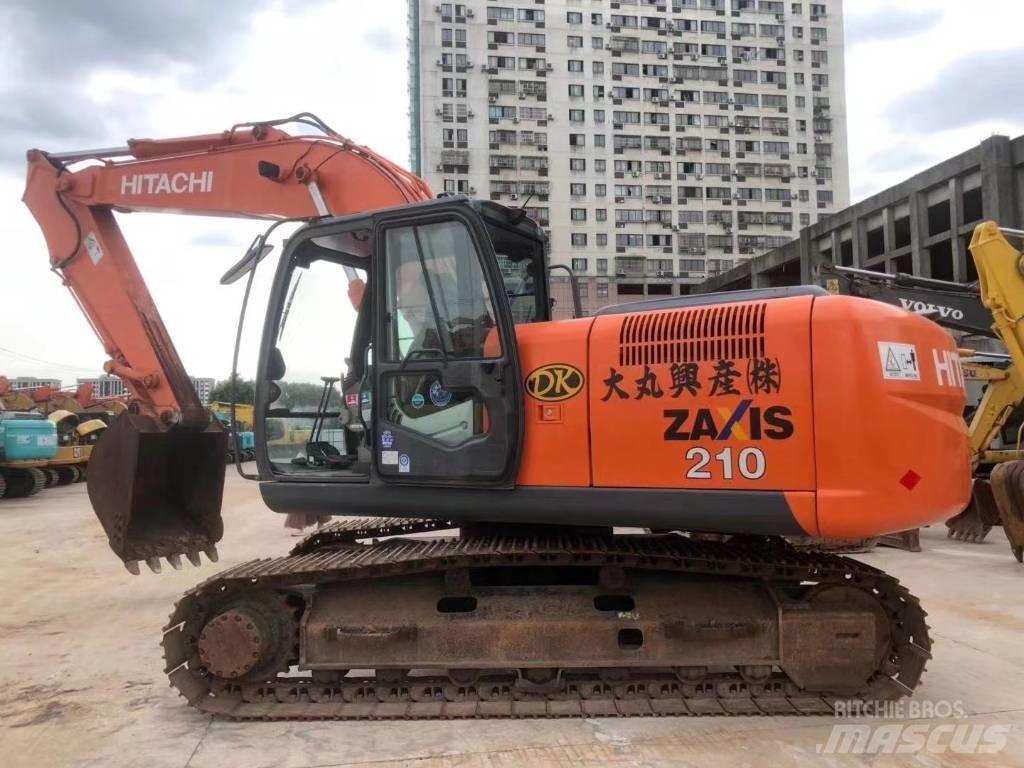 Hitachi ZX 210 Bandgrävare