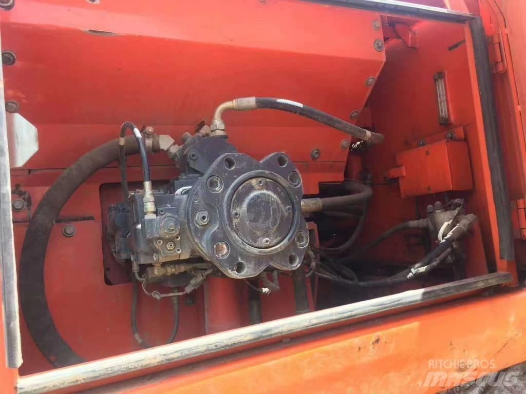 Hitachi ZX 210 Bandgrävare