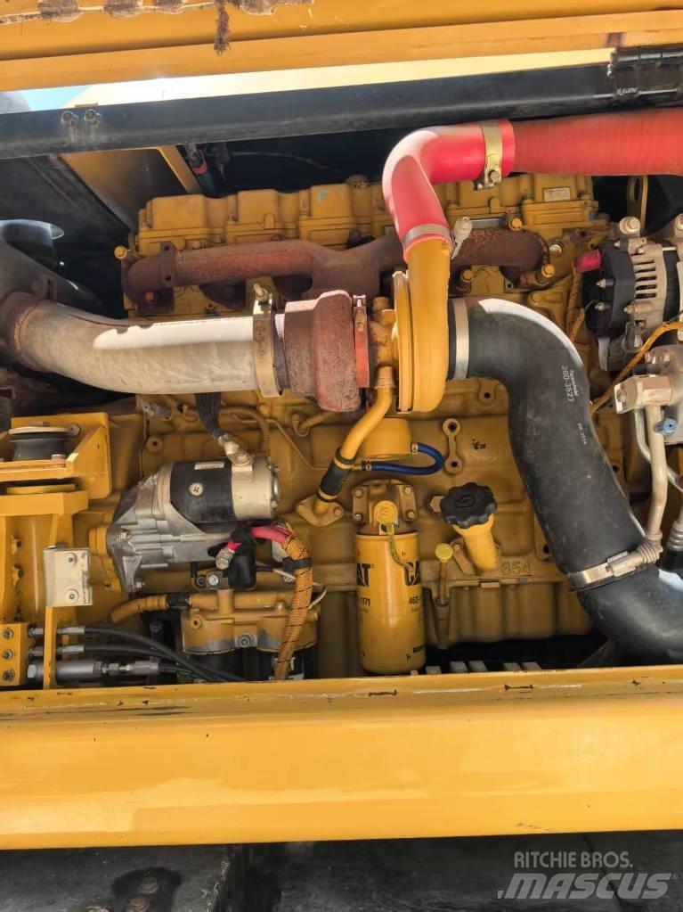 CAT M 320 Hjulgrävare