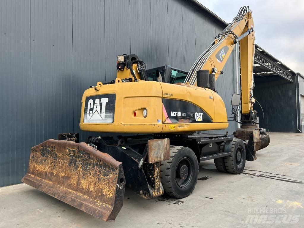 CAT M318D MH Avfalls / industri hantering