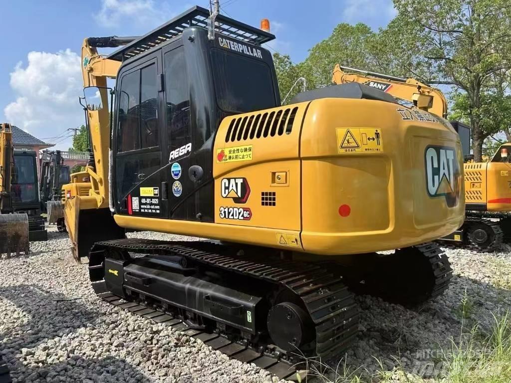 CAT 312 DGC Bandgrävare
