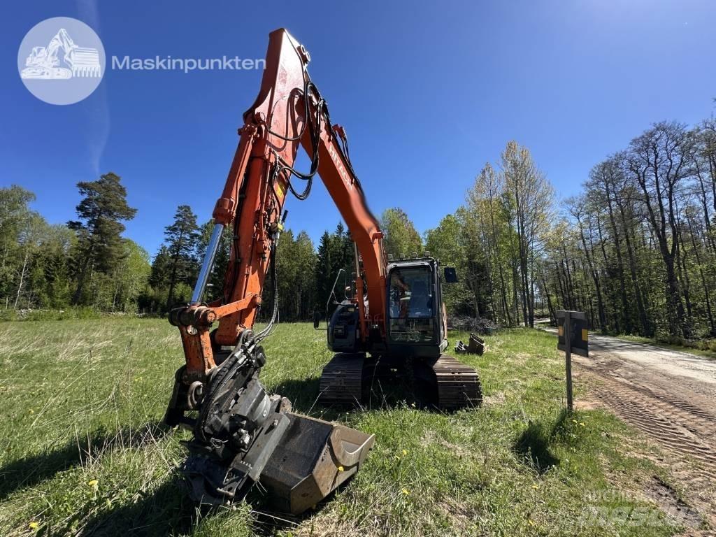 Hitachi ZX 135 US-6 Bandgrävare