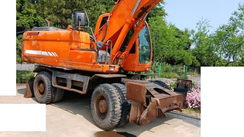 Doosan DX 210 W Hjulgrävare