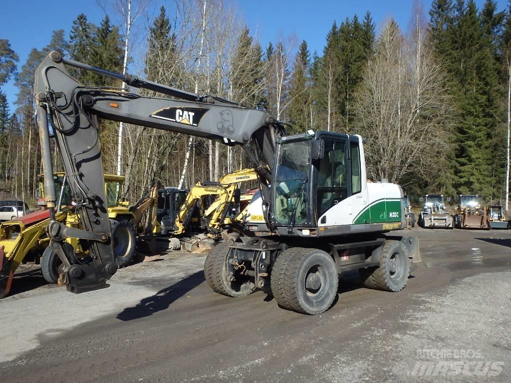 CAT M 313 C 4x4 Hjulgrävare