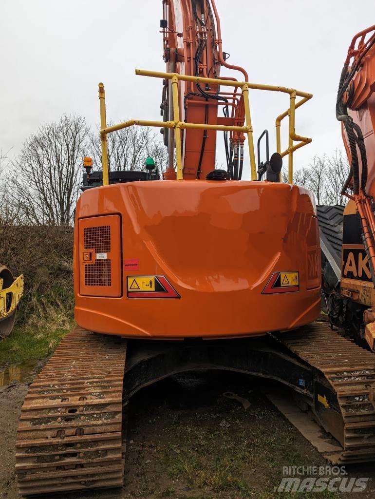 Hitachi ZX225US-7 Bandgrävare