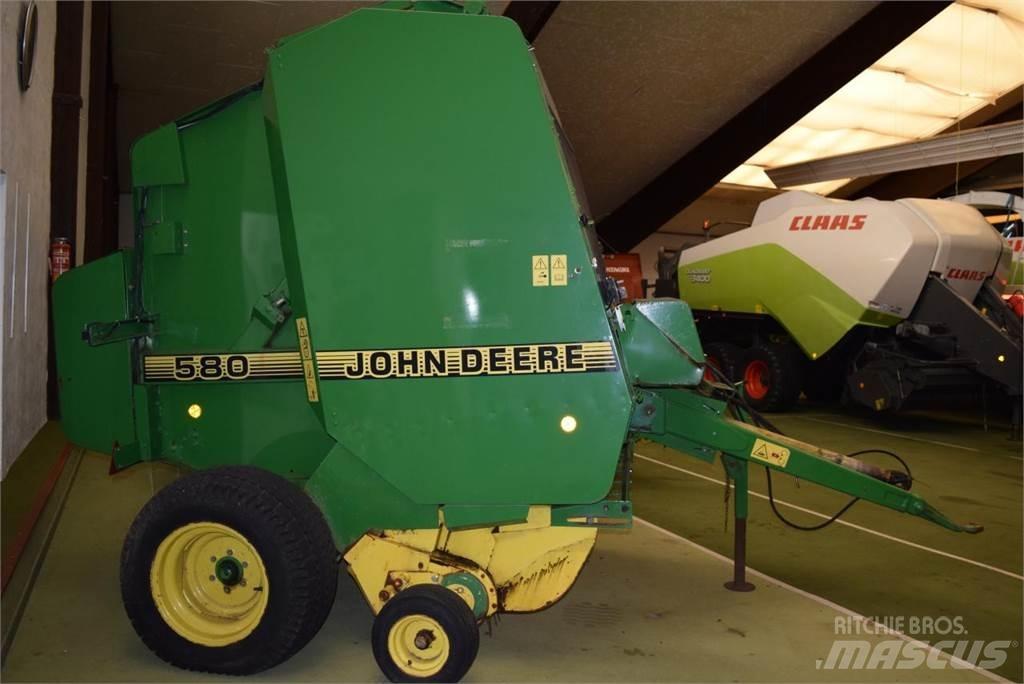 John Deere 580 Rundbalspressar