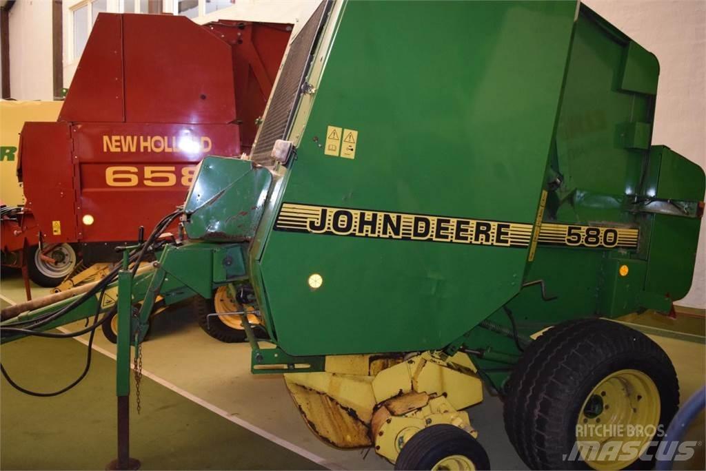 John Deere 580 Rundbalspressar