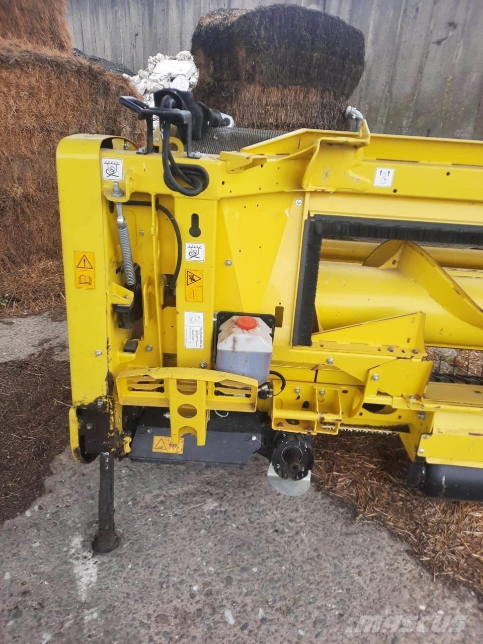 John Deere 8200 i Självgående fälthackar