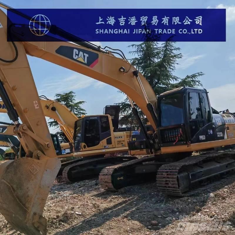CAT 323 D Bandgrävare