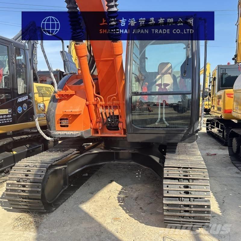 Hitachi ZX 135 US Bandgrävare