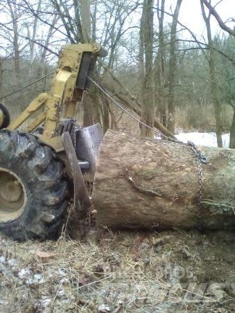 CAT 515 Skidder Kompaktlastare